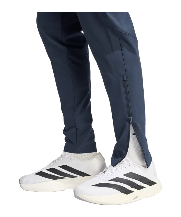 cestovní kalhoty adidas argentina tiro modré