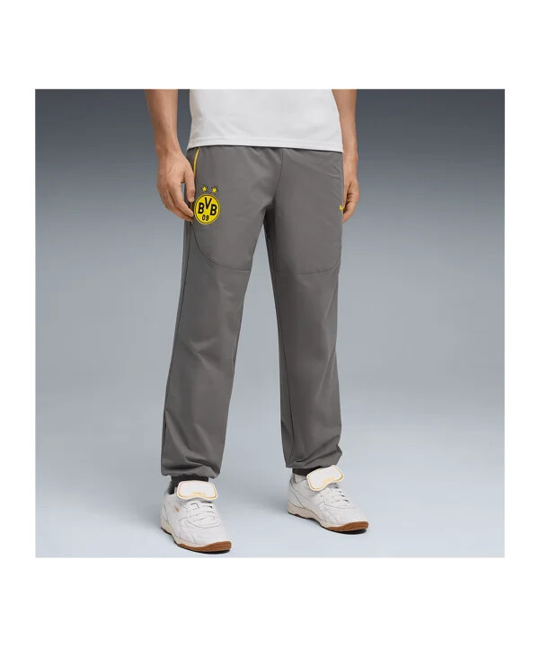 puma borussia dortmund pumatech woven kalhoty šedé f21