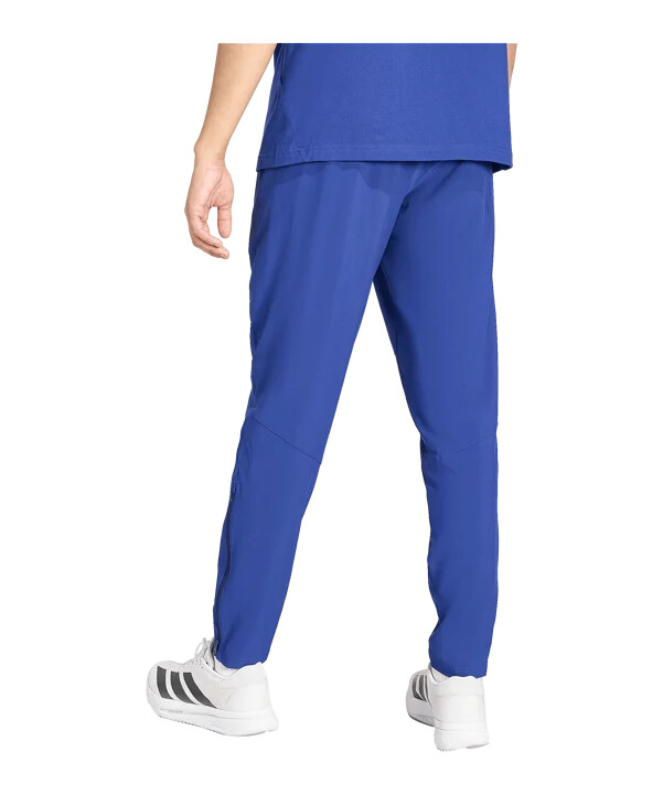 cestovní kalhoty adidas italy tiro modré