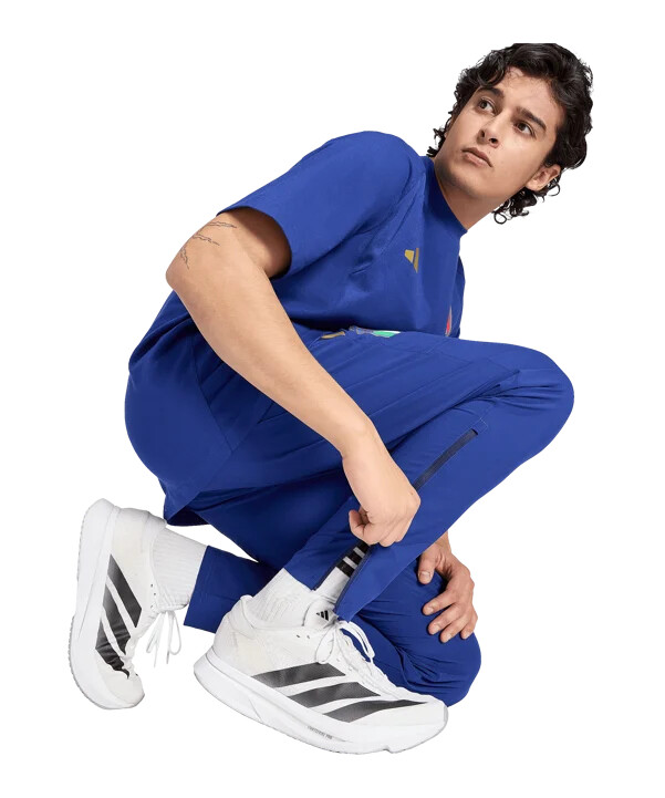 cestovní kalhoty adidas italy tiro modré