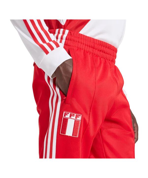 Červené tréninkové kalhoty adidas peru
